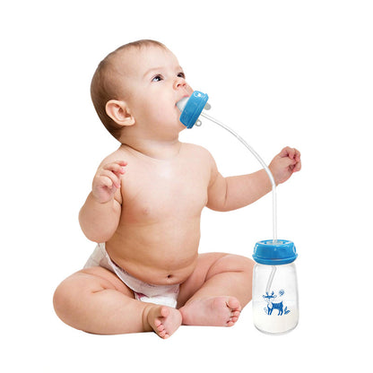 Baby sitting with a blue sippy cup and straw on a white background