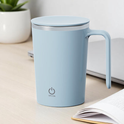 Light blue mug with a power symbol on a desk with a plant and notebook.