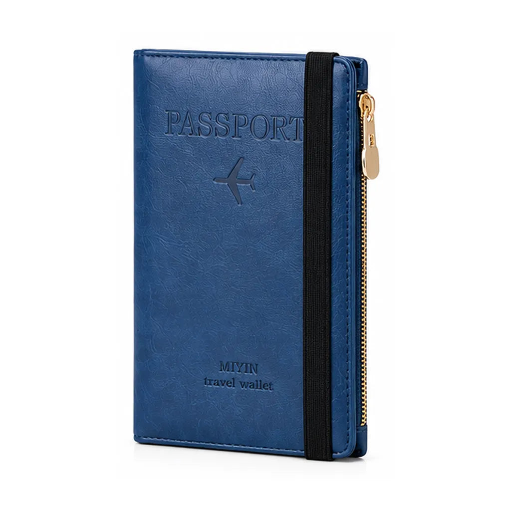 A blue faux-leather passport holder travel wallet with an elastic closure band, a gold zipper, and an embossed passport design on the front, shown on a white background.