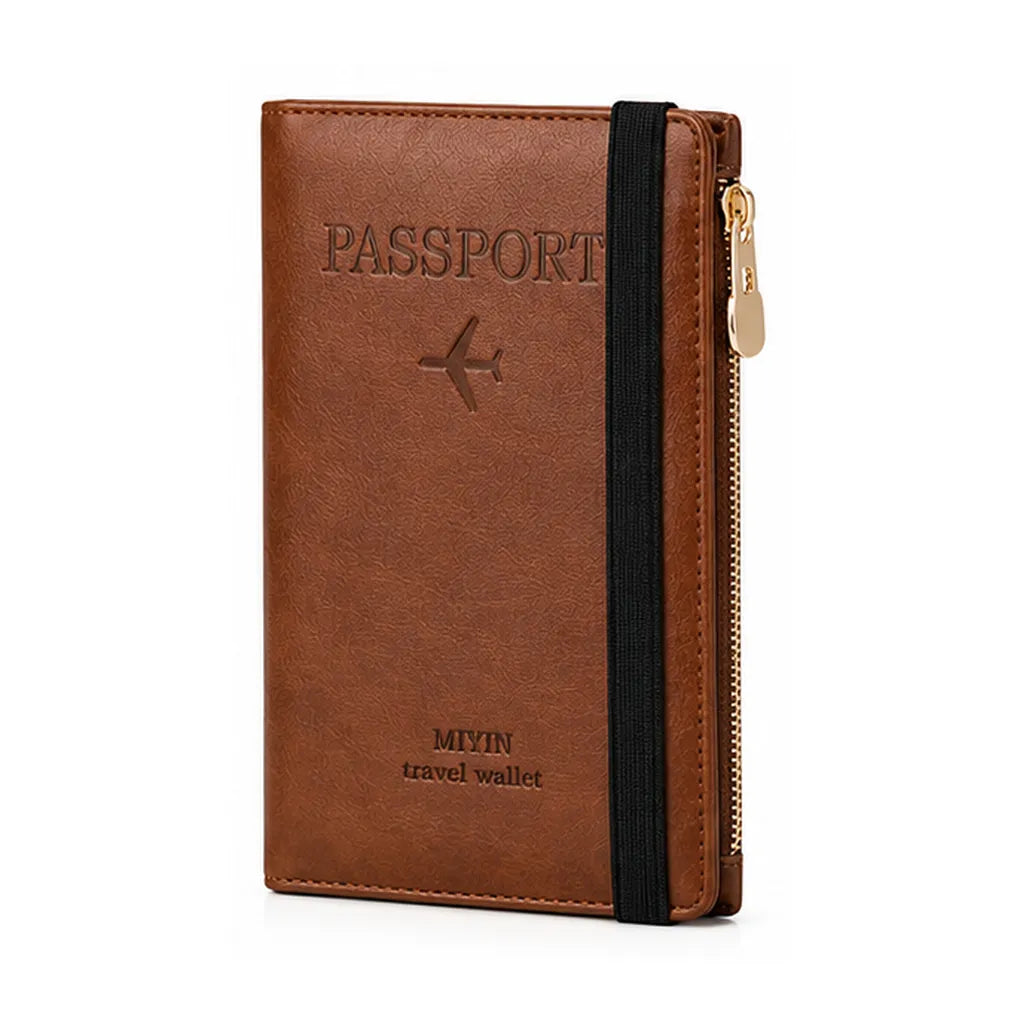 A brown faux-leather passport holder travel wallet with a black elastic band and gold zipper, featuring an embossed passport design and the brand name 'MIYIN travel wallet'.