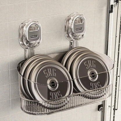 Set of weight plates in a holder on a tiled wall