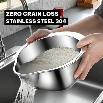 Person holding a stainless steel colander over a sink with rice being drained.