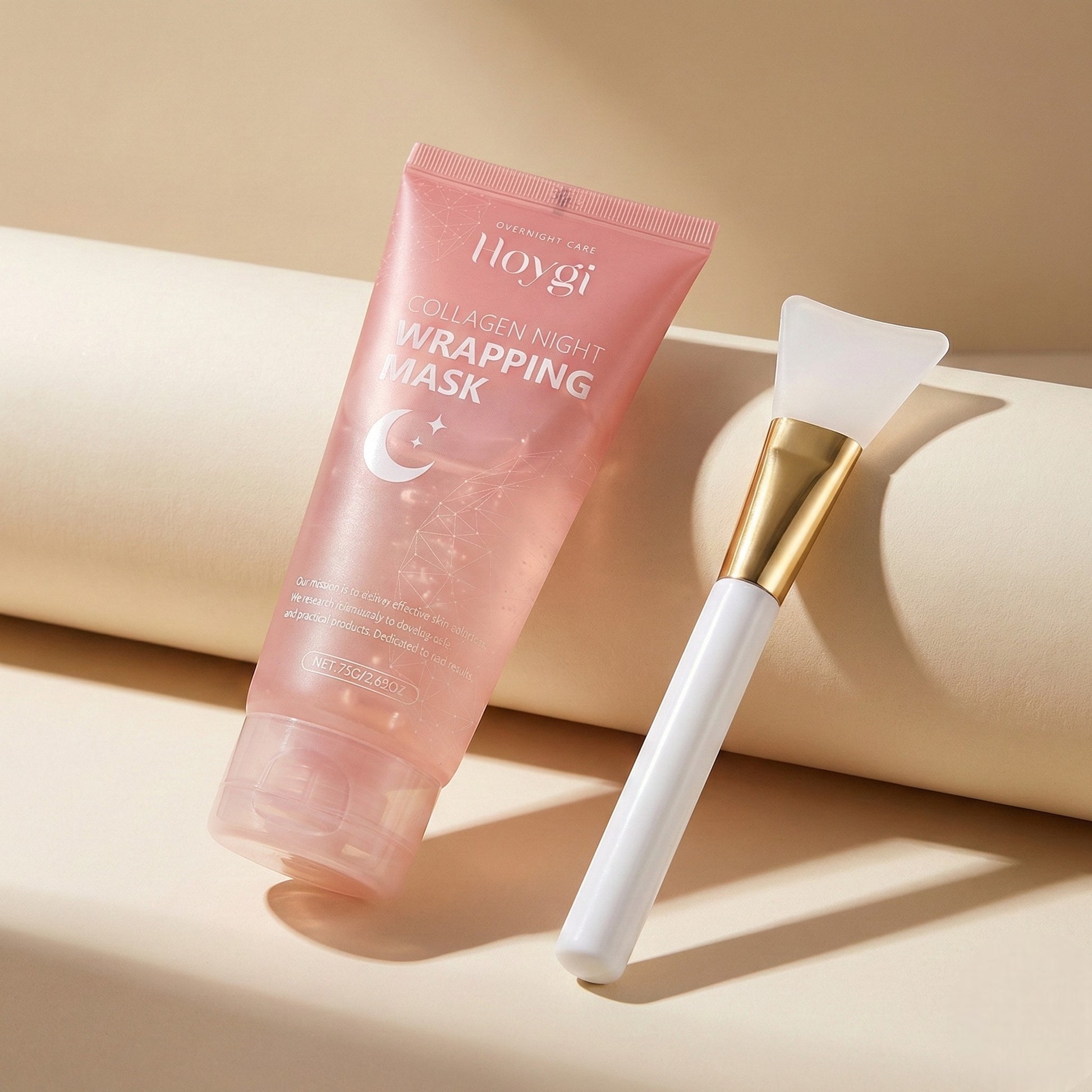 Hoygi Collagen Night Wrapping Mask with packaging and applicator on a white background