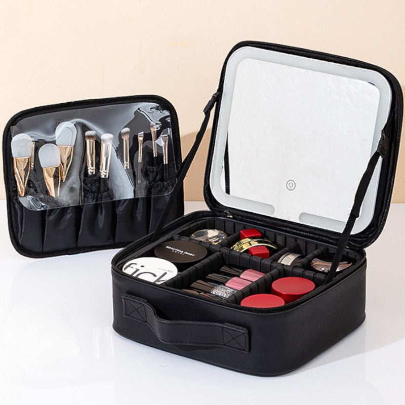 Black makeup case with cosmetic items on a white background