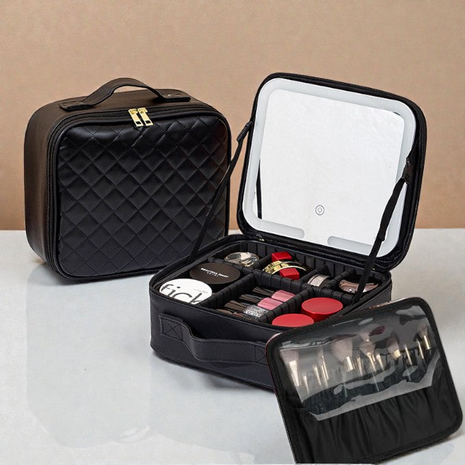 Black quilted makeup case with open lid showing various cosmetic items on a beige background.