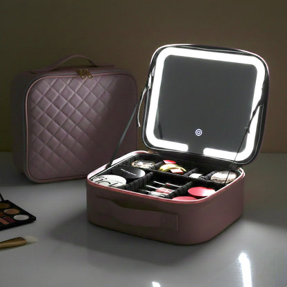 Pink makeup case with mirror and cosmetics on a neutral background