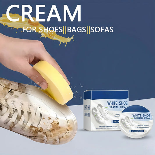 White shoe cleaning cream being applied to a dirty sneaker with packaging in the background.